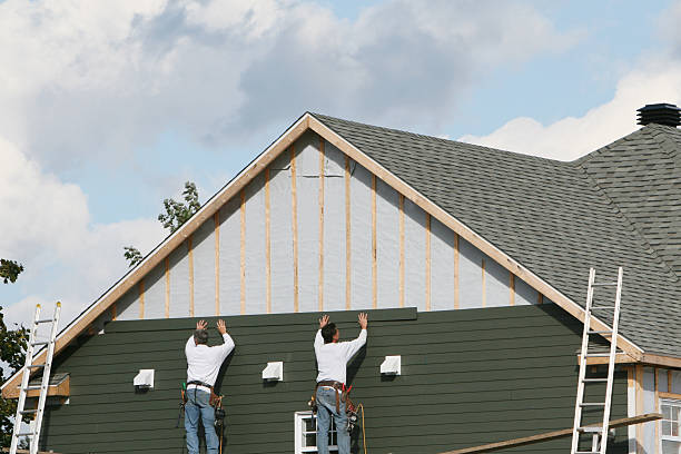 Professional Storm Damage Siding Repair technician working in La Jose, PA
